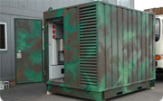 Exterior view of a green and brown container